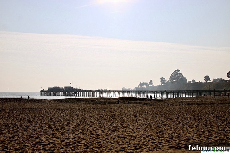 Surf, Sips, and City: San Jose to Livermore California Weekend 18 The scenic Capitola boardwalk with colorful houses and beachgoers, offering a quintessential coastal California experience.