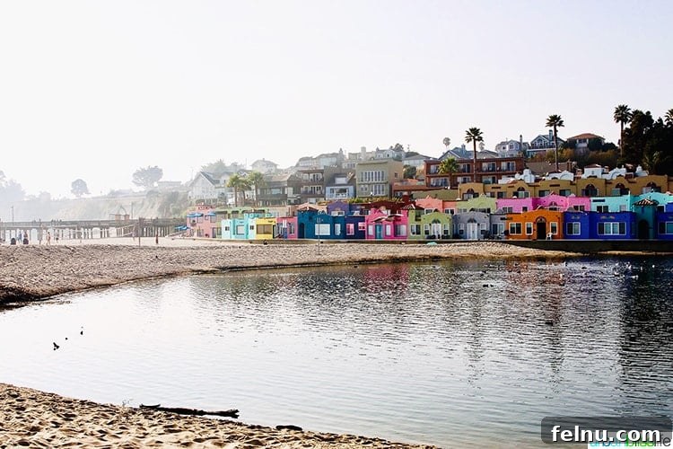Surf, Sips, and City: San Jose to Livermore California Weekend 24 Scenic aerial view of Capitola's colorful Venetian Court apartments and the bustling boardwalk, a true California gem.