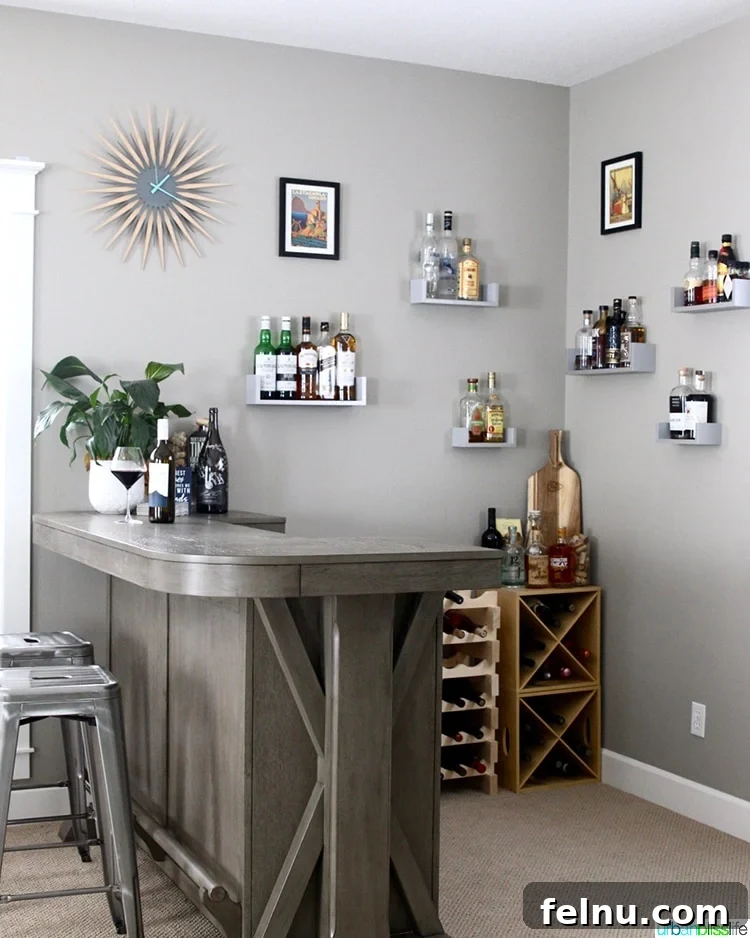 Side view of a well-stocked home bar with ample storage