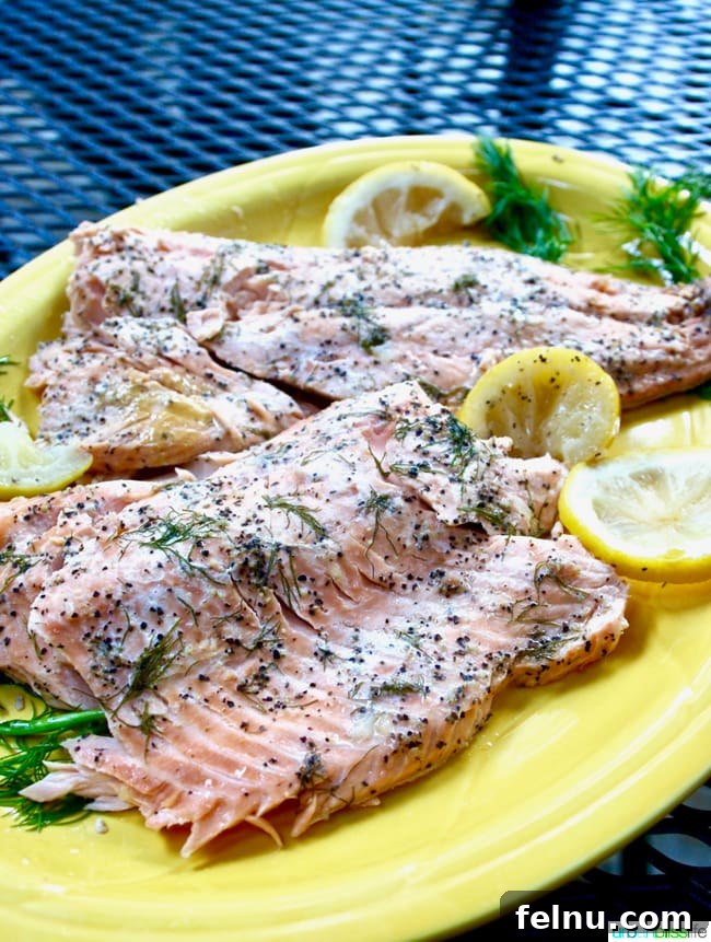 Effortless Oven Baked Salmon and Veggies 11 Grilled Salmon with Lemon & Herbs in Foil, recipe on UrbanBlissLife.com