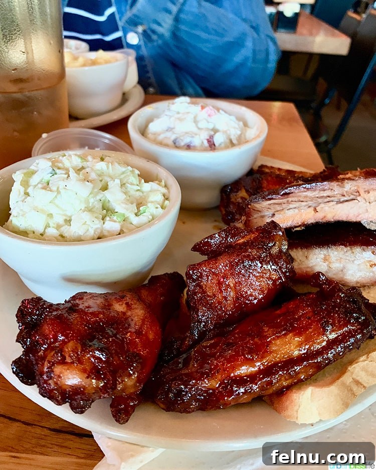Atlanta's Hottest Dining Destinations 13 A mouth-watering plate of perfectly smoked ribs at Fox Bros BBQ in Atlanta, showcasing their famous barbecue.