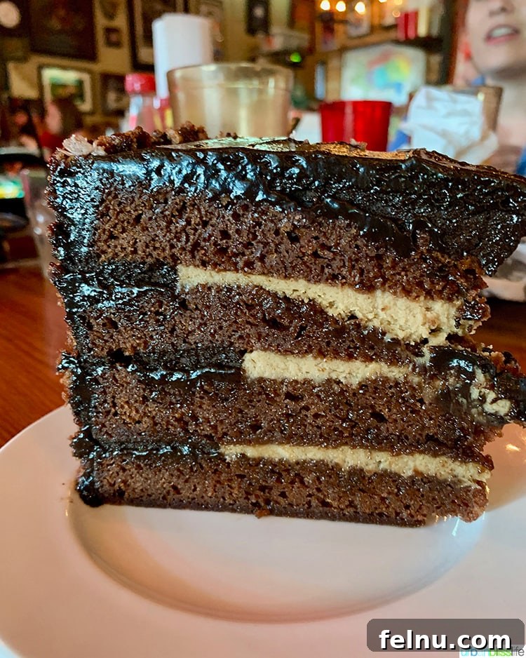 Atlanta's Hottest Dining Destinations 14 A delectable slice of Dr. Pepper Chocolate Cake at Fox Bros BBQ in Atlanta, a sweet ending to a savory meal.
