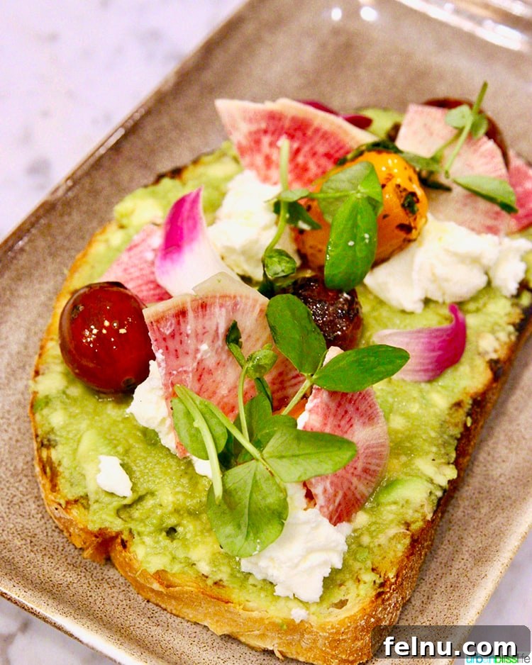 Atlanta's Hottest Dining Destinations 25 A gourmet avocado toast with fresh ingredients at Local Motives in Atlanta.