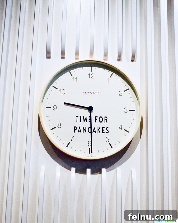 Atlanta's Hottest Dining Destinations 6 A decorative clock at Pancake Social in Atlanta, reminding guests it's always 'Time for Pancakes'.