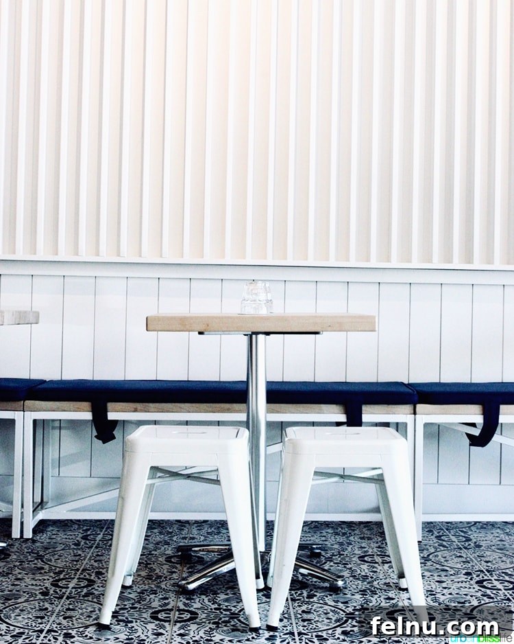 Atlanta's Hottest Dining Destinations 8 A stylish interior seating area at Pancake Social in Atlanta, with modern decor and comfortable chairs.