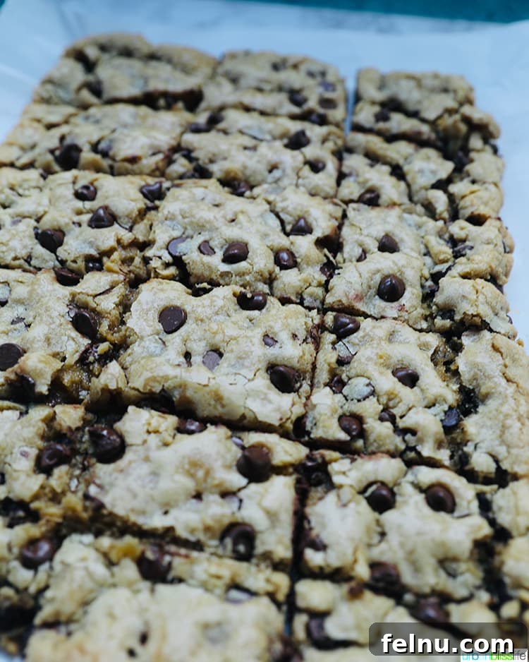 Sliced chocolate chip bars displaying their chewy texture.