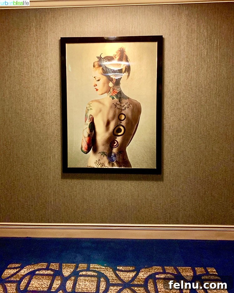 Portland Getaway: A Boutique Hotel Experience 4 Artwork at The Duniway Hotel Portland, featuring portraits of strong women along the hallway.