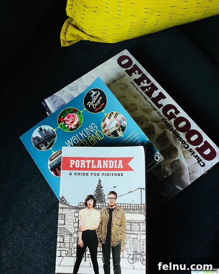 Portland Getaway: A Boutique Hotel Experience 10 Portland-themed books at The Duniway Hotel Portland, offering a glimpse into the city's culture.