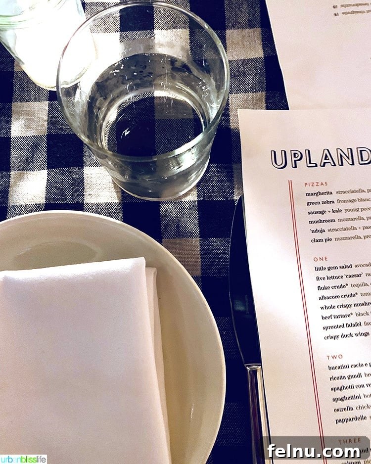 NYC in a Weekend: Your 72-Hour Adventure 35 Table setting at Upland restaurant, showcasing its menu.