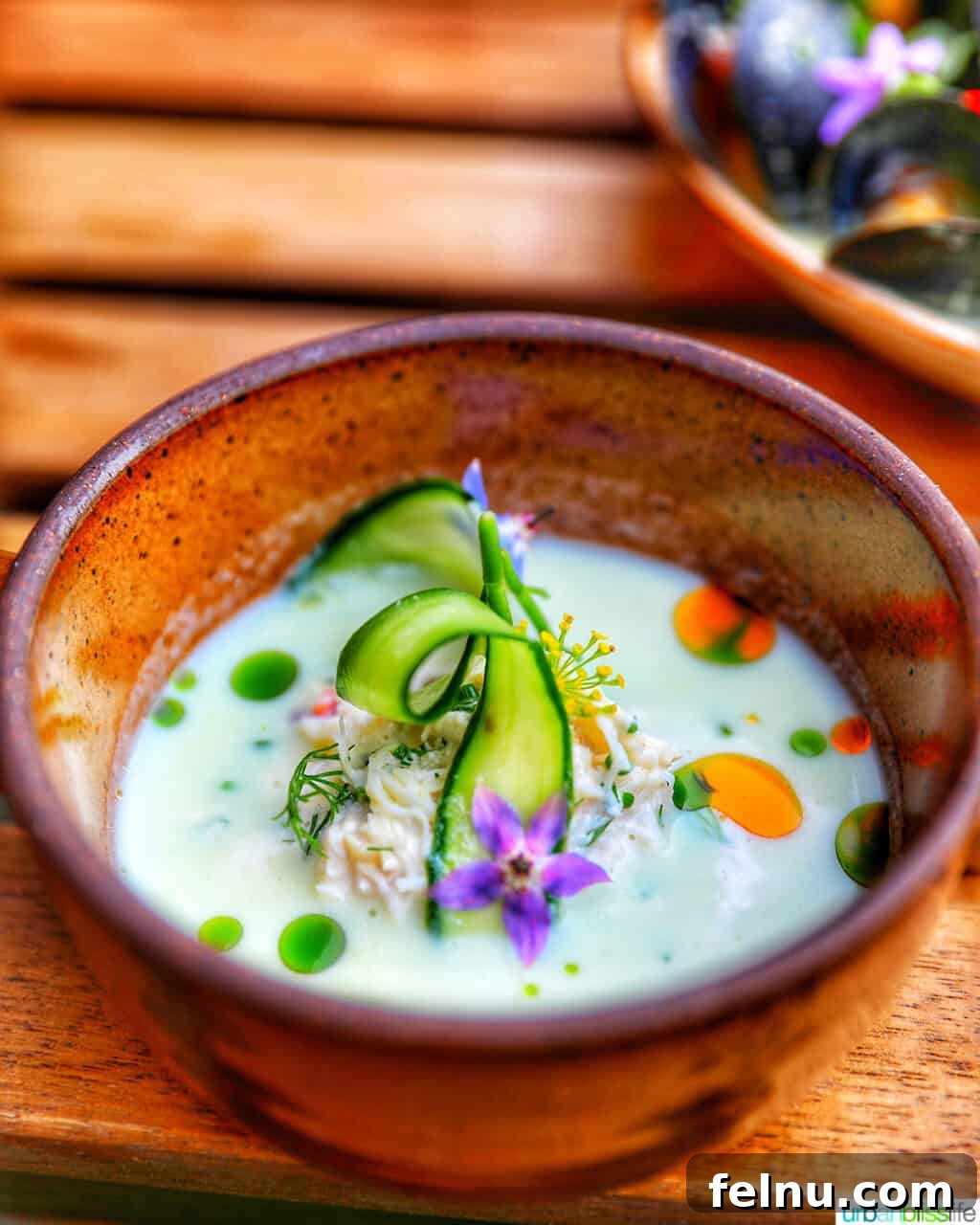 Celebrate in Style: Portland's Finest Restaurants 13 A rich, comforting soup at Quaintrelle restaurant in Portland, Oregon, served with artistic flair.