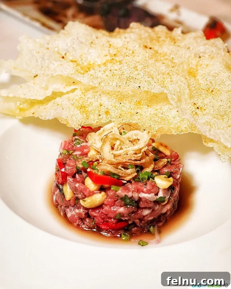 Celebrate in Style: Portland's Finest Restaurants 17 A refined tartare dish at Ringside Steakhouse in Portland, elegantly presented.