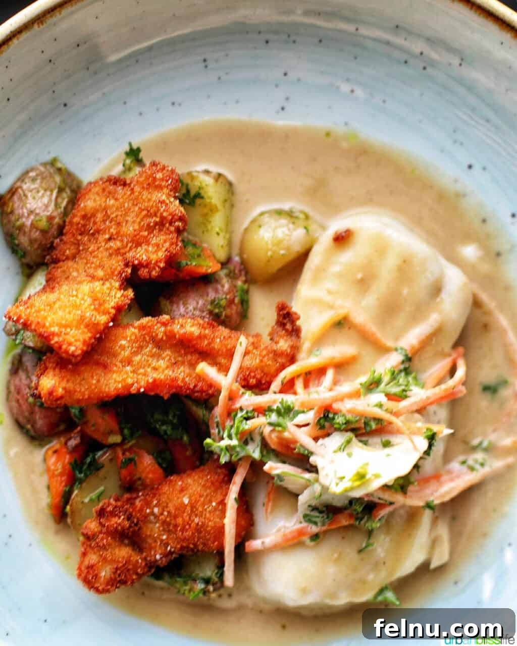 Celebrate in Style: Portland's Finest Restaurants 42 A delicately fried fish dish at Le Pigeon restaurant in Portland, Oregon, beautifully plated.