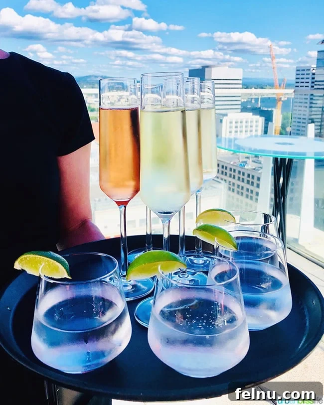 Celebrate in Style: Portland's Finest Restaurants 48 Elegant glasses of champagne and rosé at Departure, perfect for a celebratory toast.