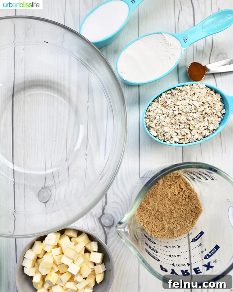 Bake Ahead Bliss: Delicious Christmas Cookies for Your Freezer 3 ingredients for apple pie bars laid out on a baking surface.