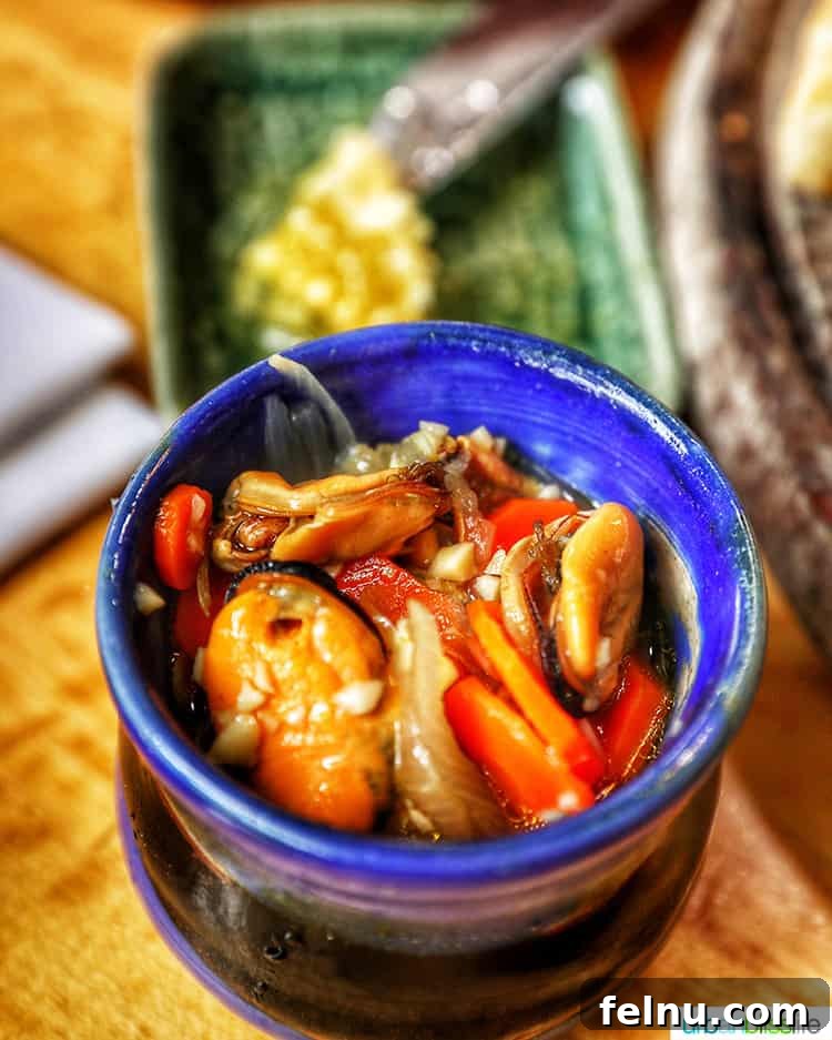 A plate of Olympia Provisions Mussels Escabeche.