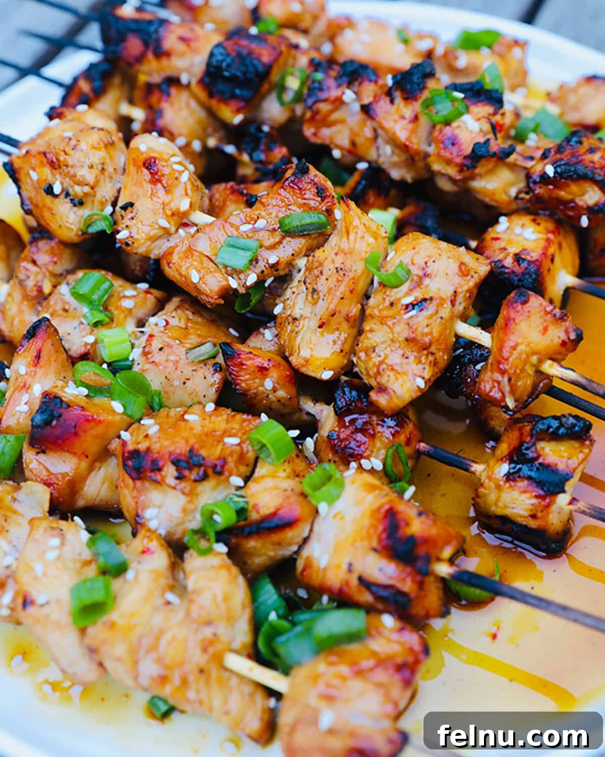 Honey Garlic Chicken Kebabs 3 Close Up of Honey Garlic Chicken Skewers with Green Onion Slices