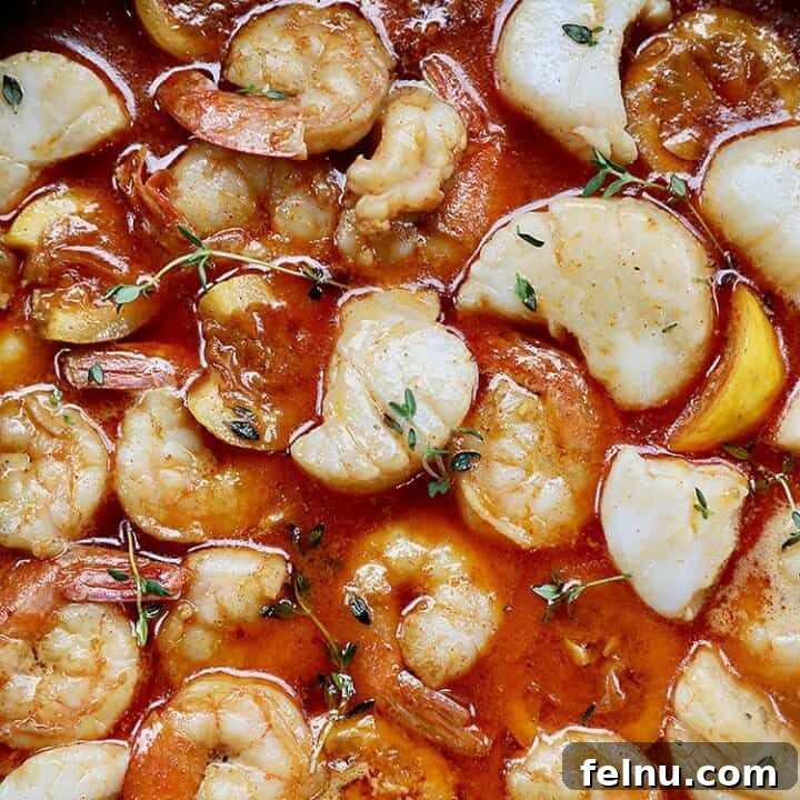 closeup of New Orleans-style BBQ shrimp and scallops