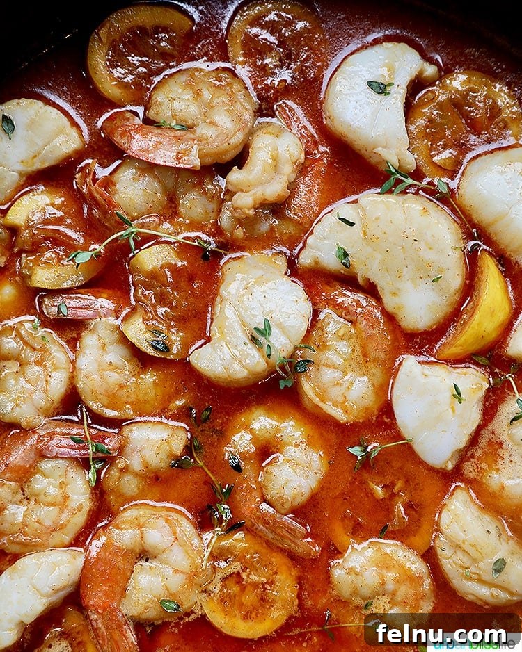 closeup of New Orleans-style BBQ shrimp and scallops