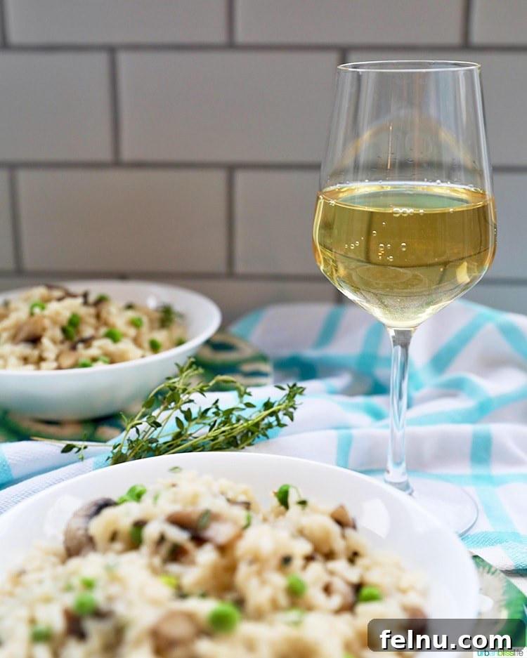 Mushroom Magic: Creamy Vegan Risotto in Minutes 13 Instant Pot Mushroom Risotto paired with a glass of white wine.