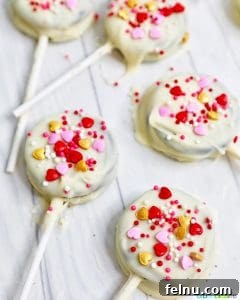 Valentine's Day Oreo Delights 15 chocolate covered OREOs with pink and red heart sprinkles