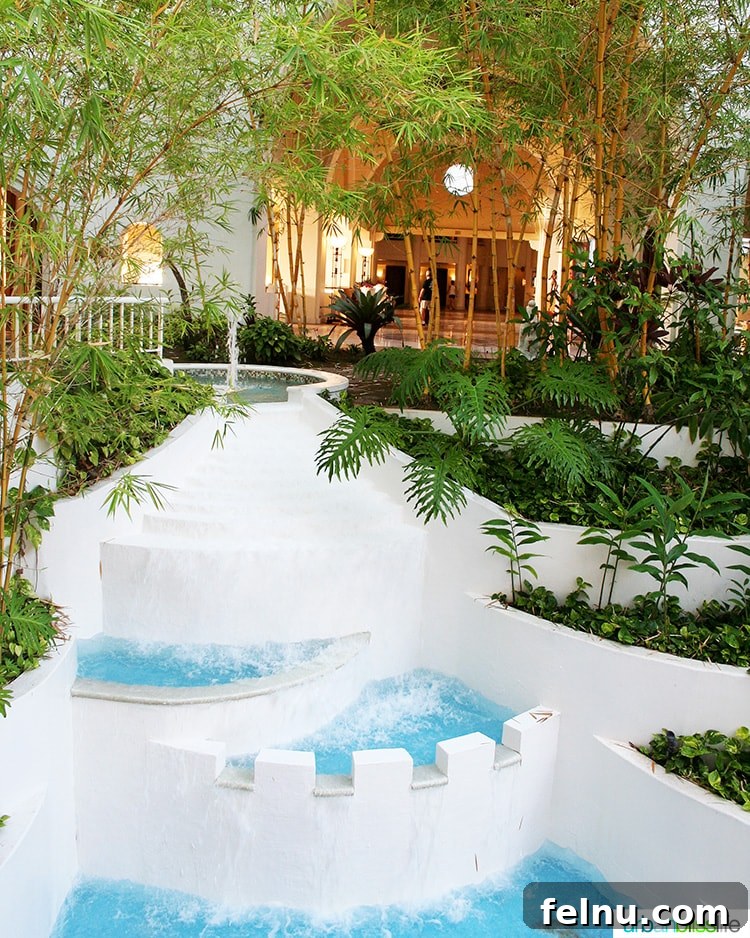 Fairmont Kea Lani: Maui's Premier Island Escape 6 Stunning indoor waterfalls creating a serene ambiance at Fairmont Kea Lani