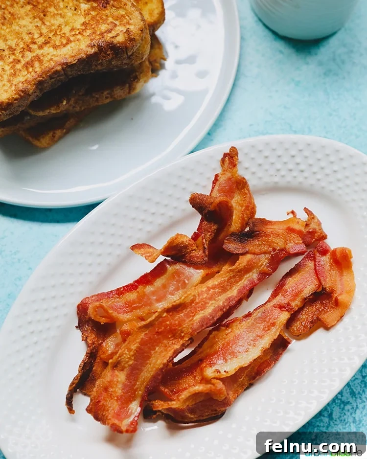 Ultimate Air Fryer Bacon 8 Air fryer bacon paired with golden french toast for a complete breakfast