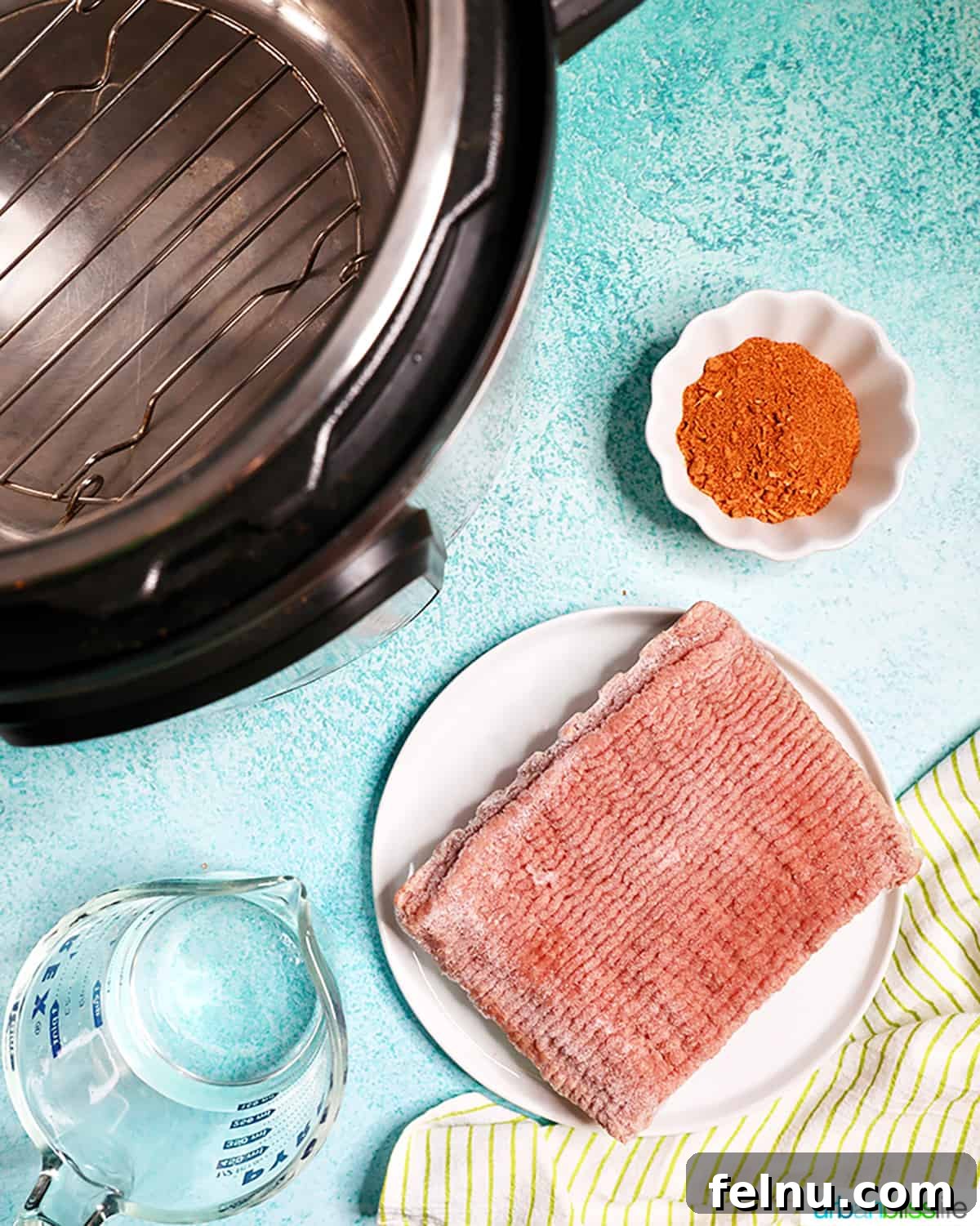 Instant Pot Fiesta Meat 3 Ingredients for Instant Pot Taco Meat: frozen ground turkey, taco seasoning, and water