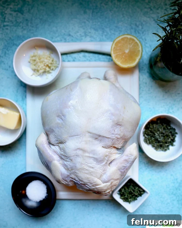 The Ultimate Air Fryer Roasted Chicken 5 Ingredients for Air Fryer Rotisserie Chicken, including herbs, lemon, and butter
