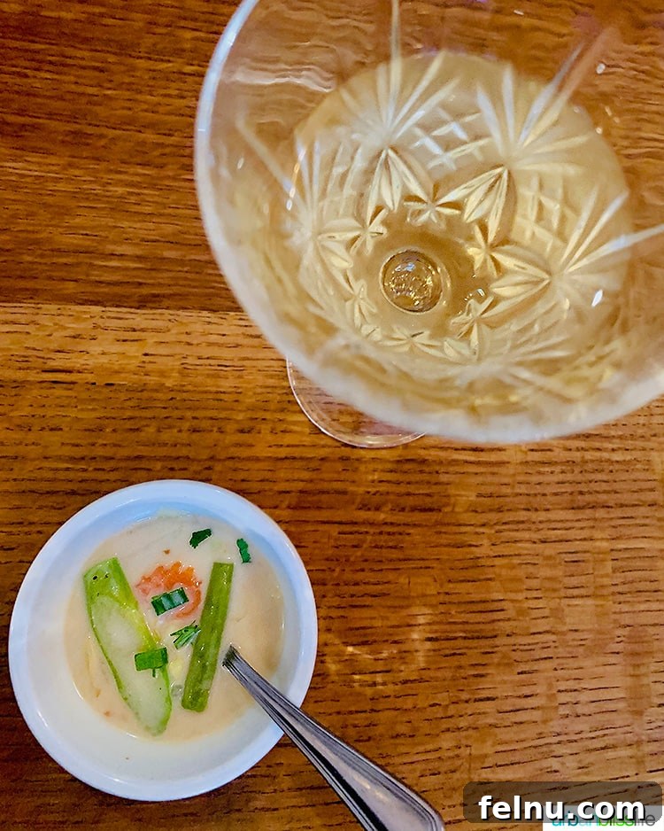 Portland's Farmhouse Table 6 Delicious Tom Kha Soup, a traditional Thai coconut milk-based soup, beautifully presented in a bowl.