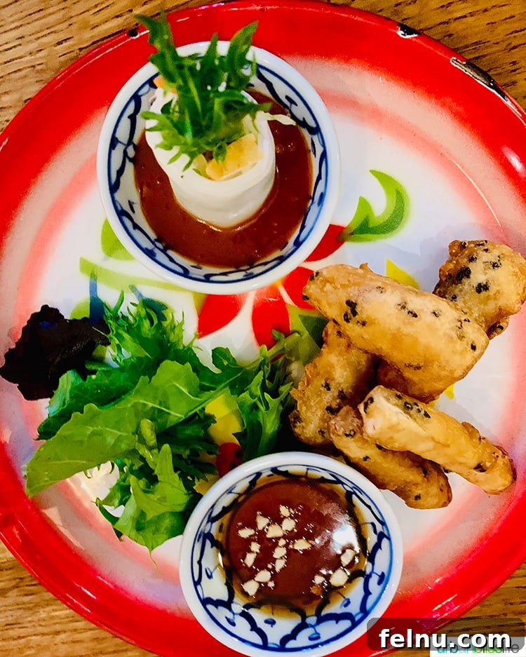 Portland's Farmhouse Table 7 Refreshing Vegan Fresh Rolls, filled with healthy ingredients and served with a flavorful dipping sauce at Farmhouse Kitchen Portland.