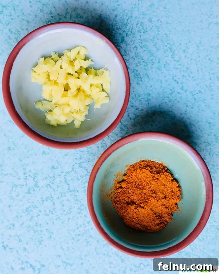 Fresh ginger and turmeric roots, key ingredients for their immunity-boosting properties.