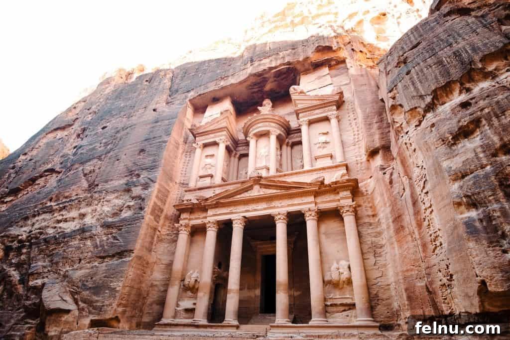 20 Virtual Journeys From The Comfort Of Your Home 15 The magnificent Treasury (Al-Khazneh) carved into the rock face in the ancient city of Petra