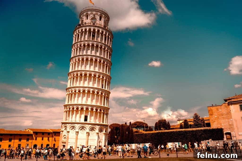 20 Virtual Journeys From The Comfort Of Your Home 9 The iconic Leaning Tower of Pisa against a blue sky