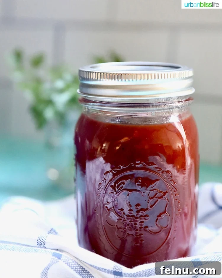 Sticky Sweet BBQ Perfection 8 A mason jar brimmed with homemade sweet BBQ sauce, sealed for freshness in the refrigerator.