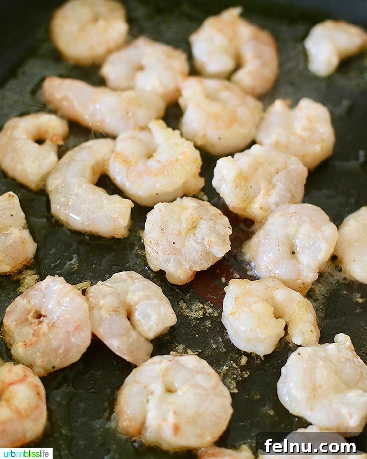 Shrimp cooking in a pan for tacos