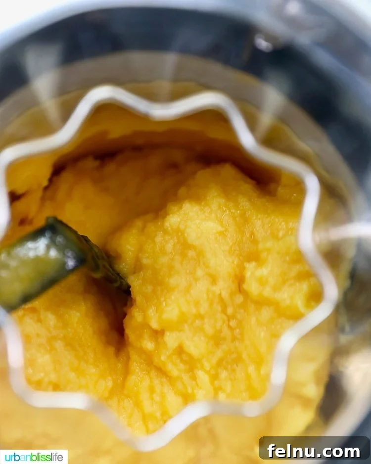 Pineapple Mango Sorbet churning in ice cream maker