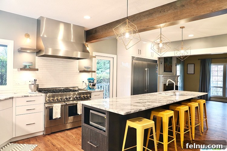 Portland Kitchen remodel wide angle facing dining room with bar stools