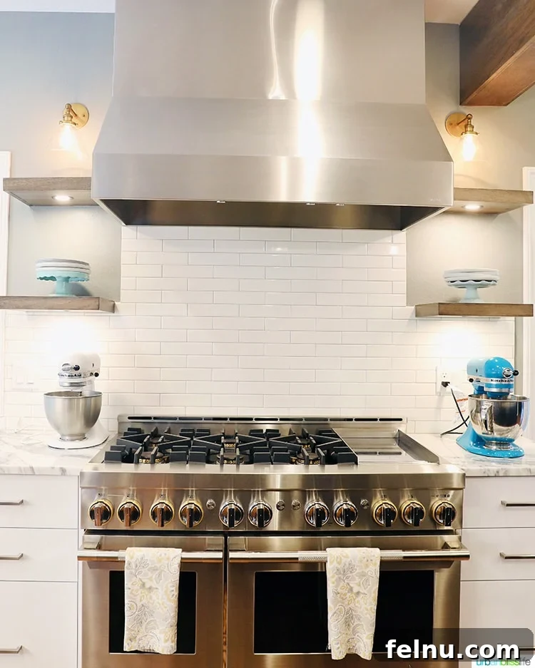 JennAir range and custom hood with floating shelves