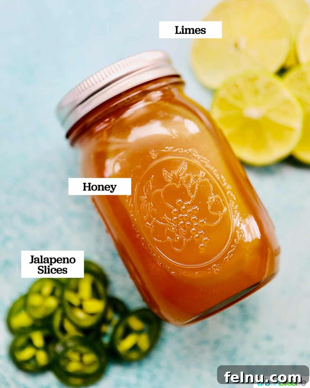 Island Oasis Margarita Pops 4 A jar of golden honey, a key ingredient for sweetening tropical margarita popsicles.