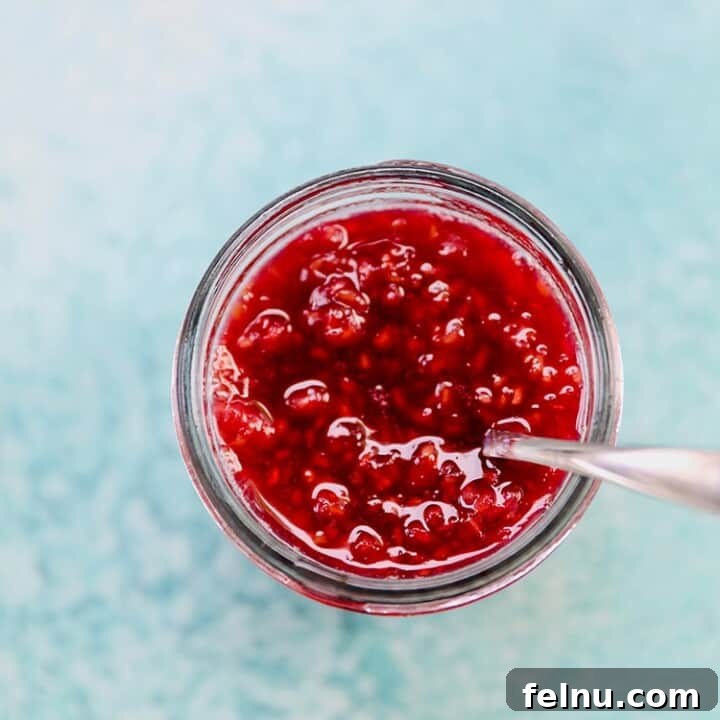 homemade raspberry jam in a jar