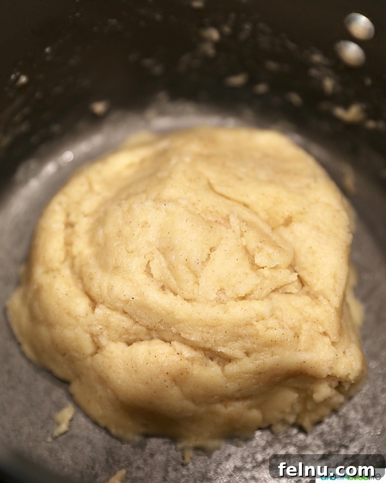 A perfectly formed ball of homemade churro dough.