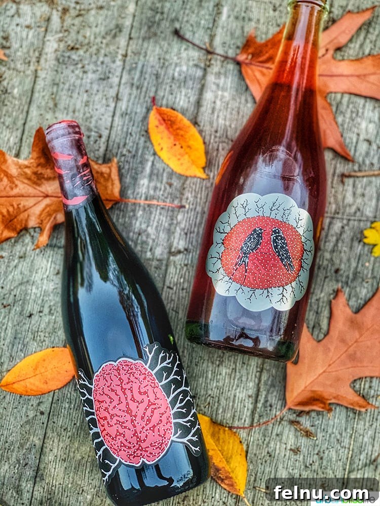 Toast to Summer: 12 Perfect Rosés for National Rosé Day 4 Art + Science PetNat Pinot Noir, a sparkling rosé, captured in two bottles, highlighting its natural and rustic charm.