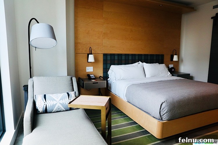 Canopy Portland: Your Pearl District Retreat 7 Guest Room Bed and Window Seat