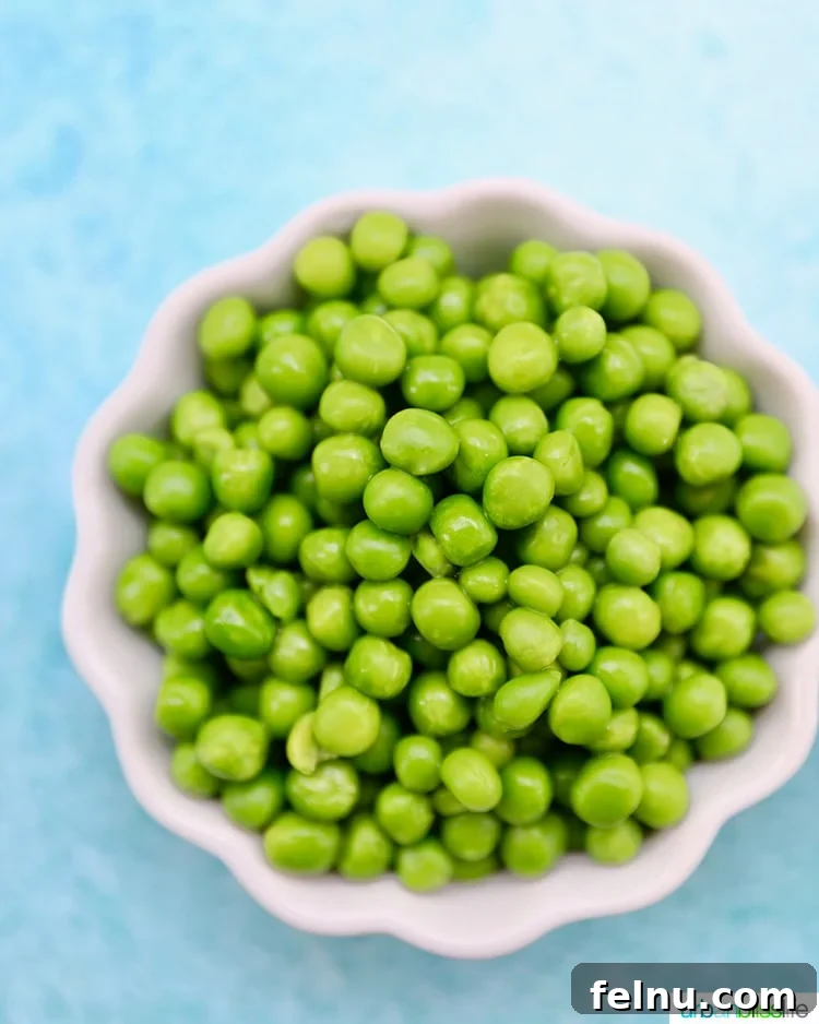 Creamy Tuna Pasta Salad 5 Bowl of fresh green peas