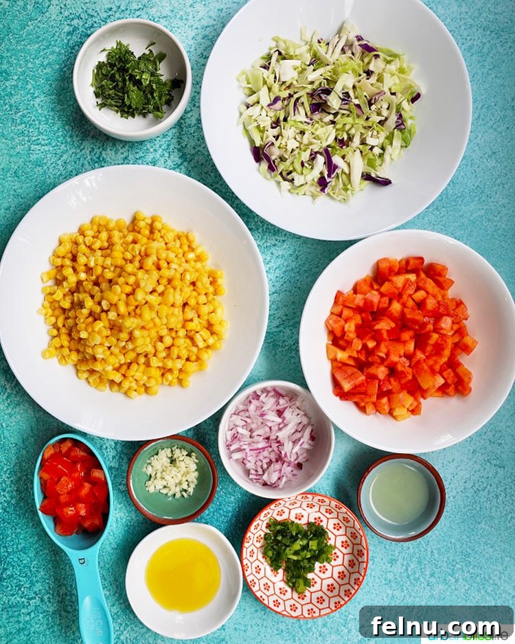 Sun-Kissed Slaw: Peaches, Corn & Tomatoes 4 A selection of fresh ingredients laid out for making summer slaw, including corn, peaches, tomatoes, and cabbage.