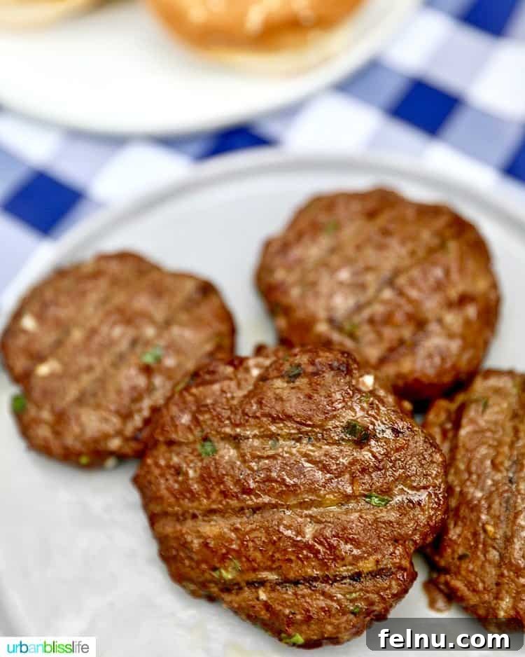 Perfectly grilled asian burgers on a plate, ready to be served and enjoyed.