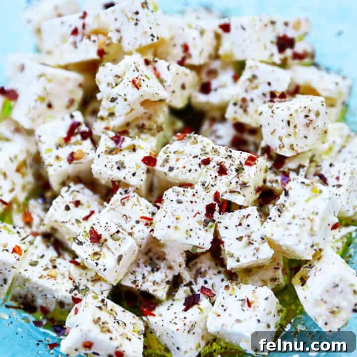 Cubes of marinated feta cheese.