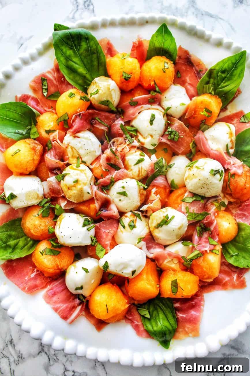 Beat the Heat Dinners 12 Bowl of melon prosciutto caprese salad, a refreshing and elegant dish.