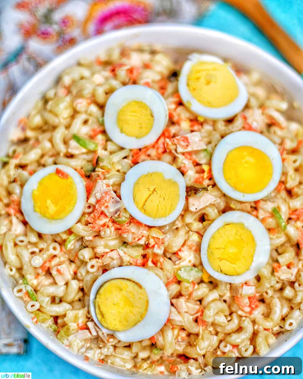 Beat the Heat Dinners 10 Filipino Macaroni Salad in a bowl, a creamy and sweet pasta salad.