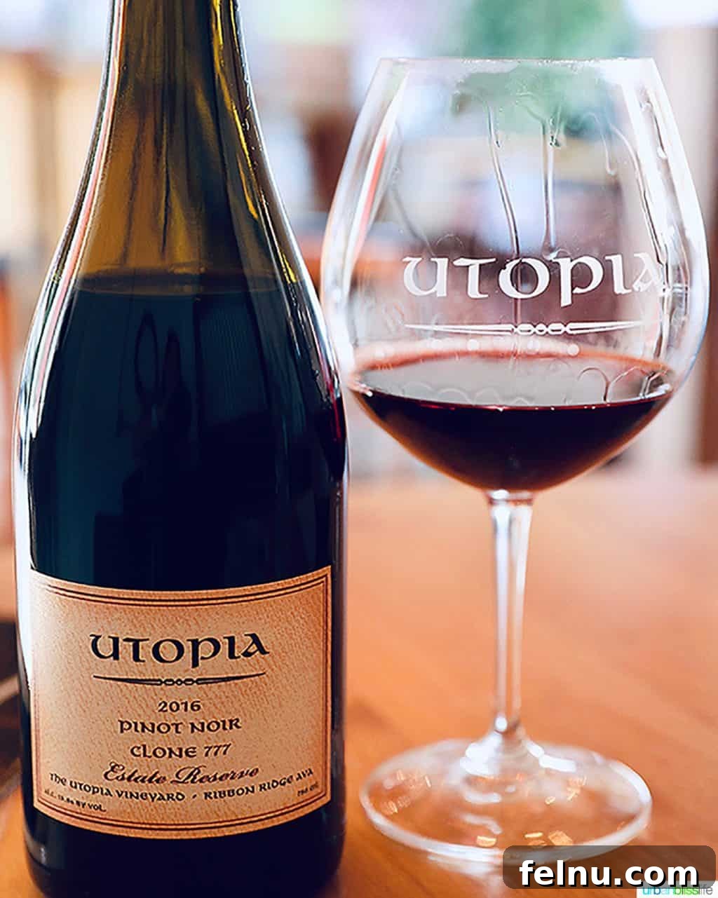 The Elysian Vineyard 9 A bottle of Utopia Vineyard Pinot Noir Clone 777, highlighting the vineyard's dedication to specific clonal expressions.